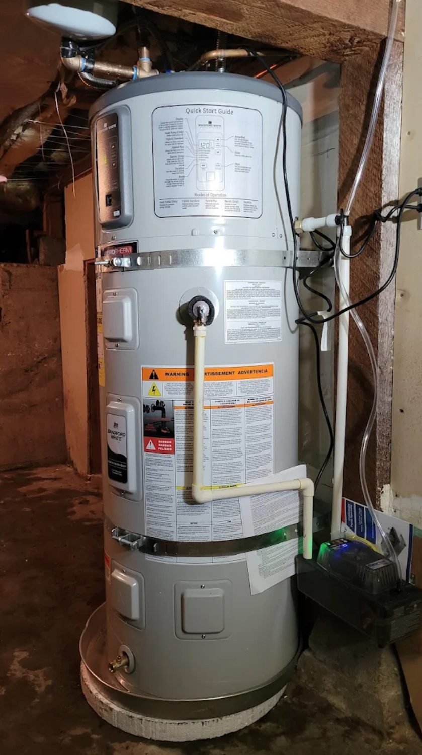Hybrid heat pump water heater installed in a basement
