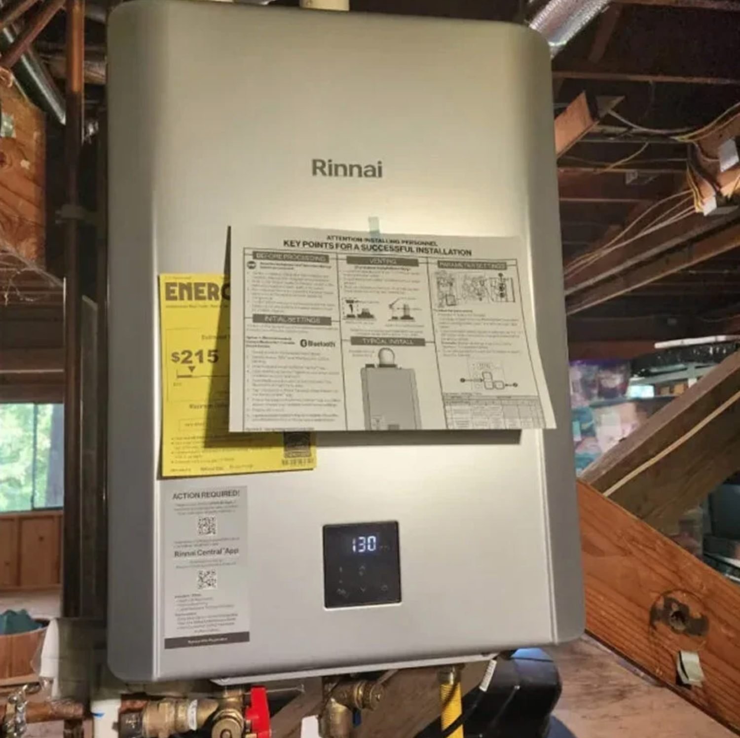 Wall mounted tankless water heater installed and commissioned